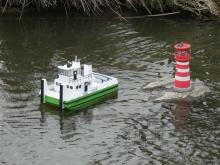 ladousův Springer u skály s majákem